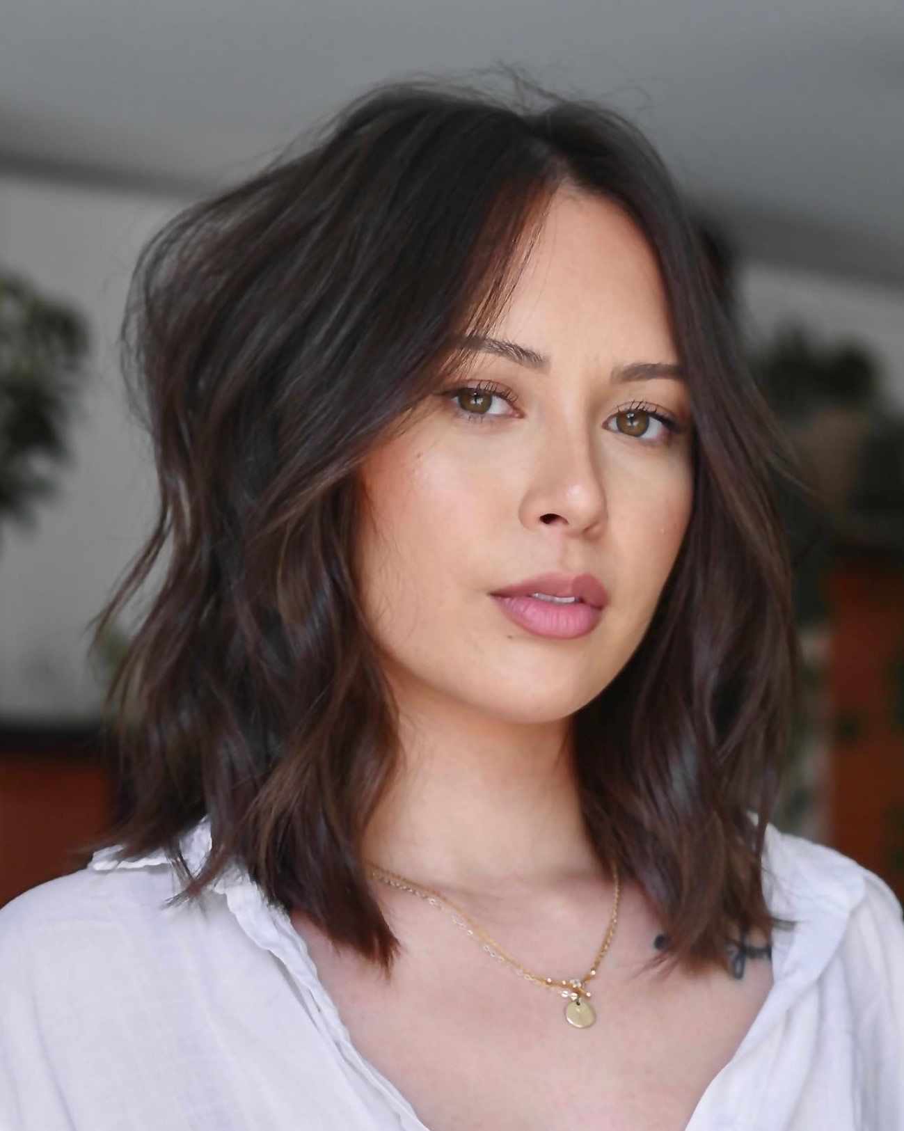 Shoulder-Length Tousled Hair with a Middle Part