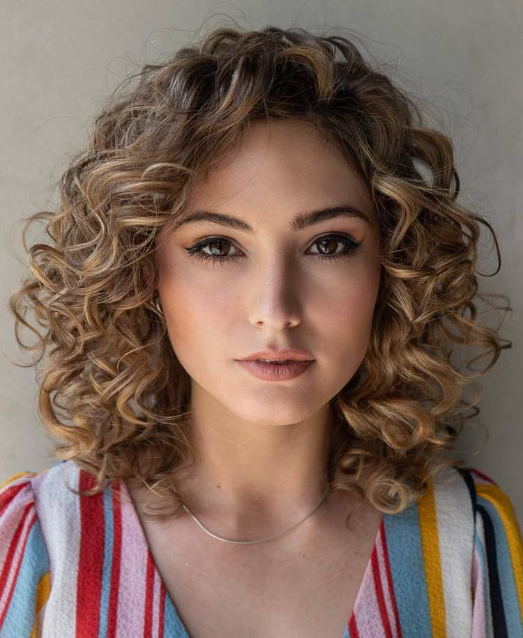 Medium Curly Hairstyle for Round Faces